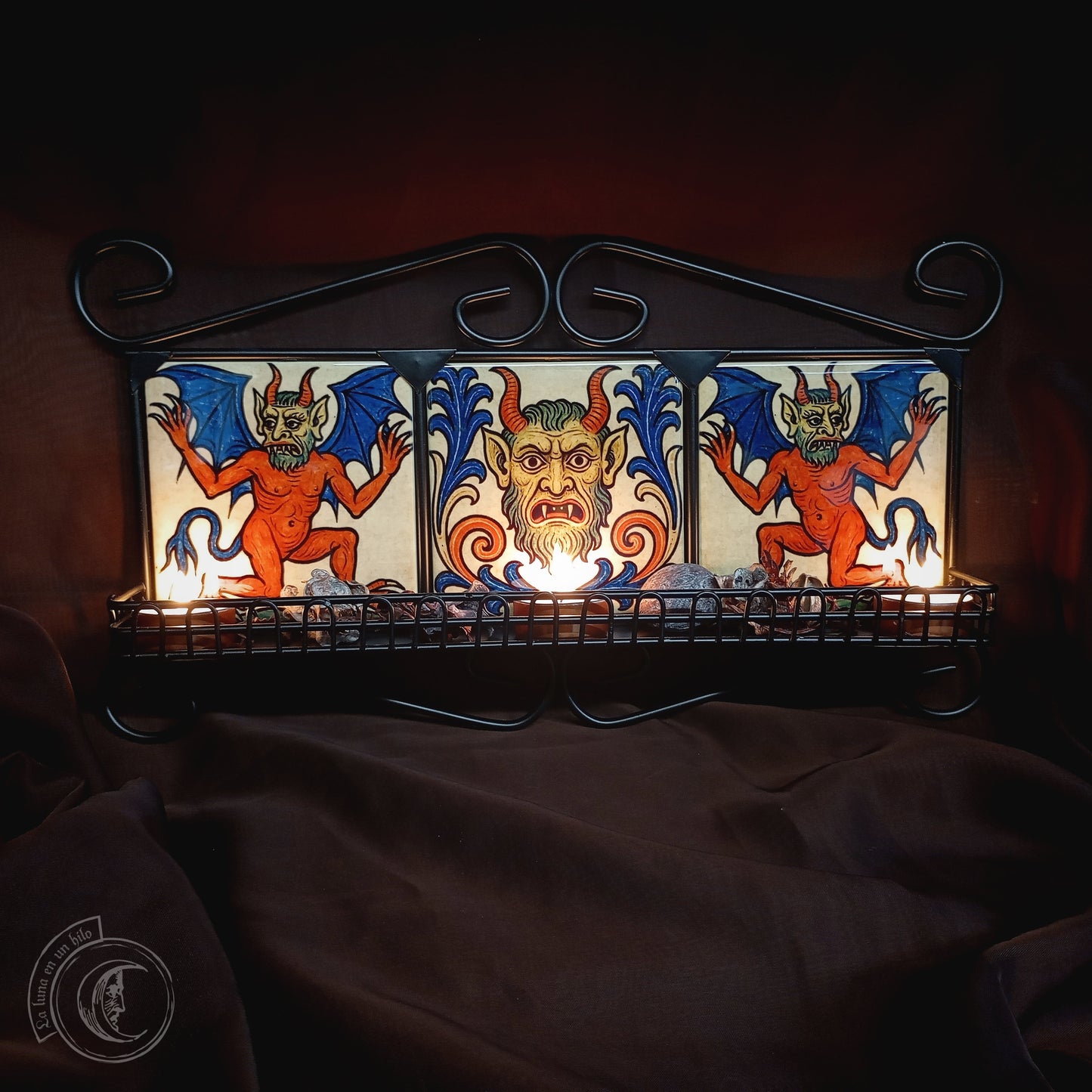 Black iron shelf with 3 medieval demon tiles
