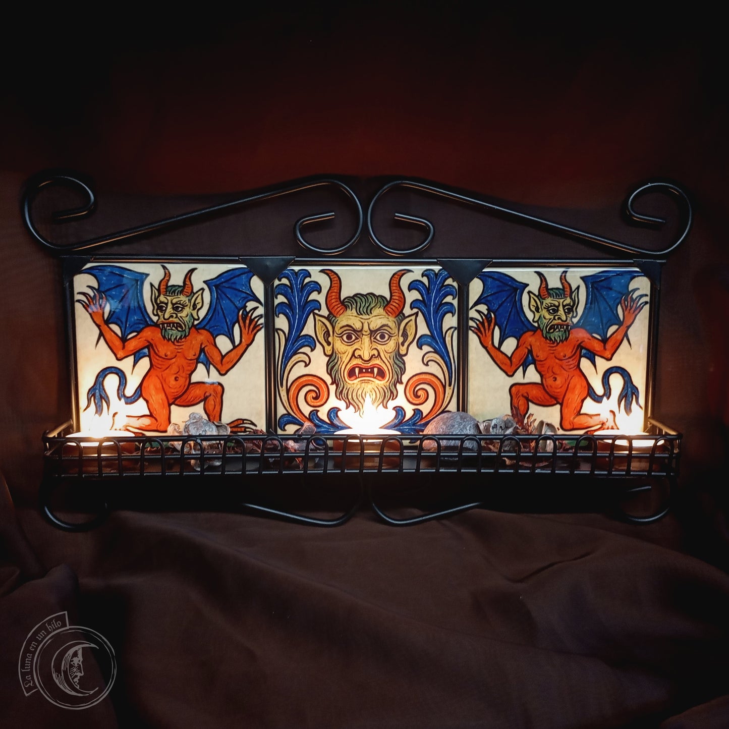Black iron shelf with 3 medieval demon tiles