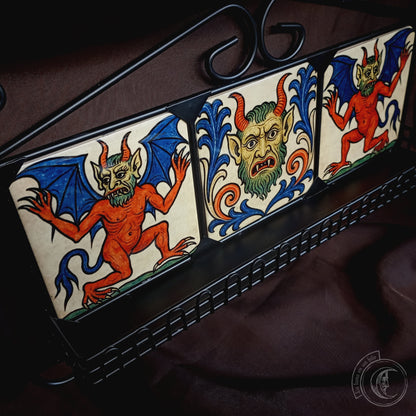 Black iron shelf with 3 medieval demon tiles
