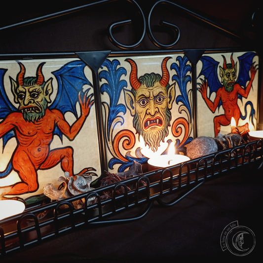 Black iron shelf with 3 medieval demon tiles